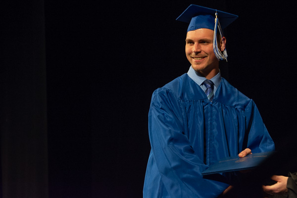 ... not long after confidently striding across the stage to claim his associate degree in forest technology.