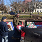 ... and helps Steve Wenzel, gym coordinator at The Salvation Army, during the load-in.