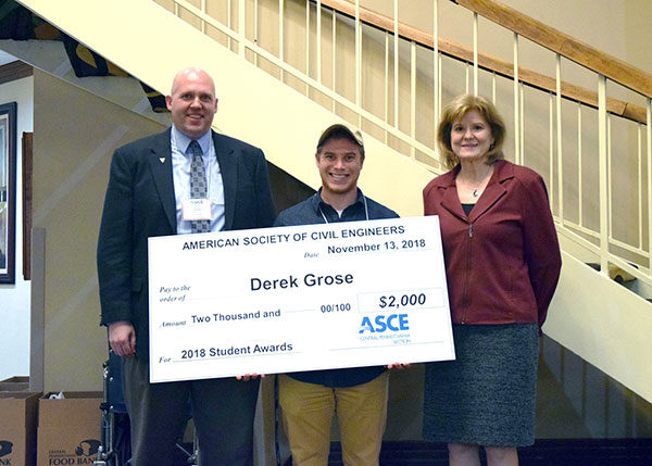 Grose is congratulated by Christopher W. Smith (left), student awards chair of the ASCE Central Pennsylvania Section, and Kerry B. Henneberger, section president. (Photo provided)