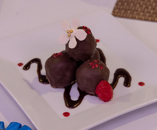 Danielle R. Wesneski’s “Raspberry Chocolate Brownie Bombs,” with a white-chocolate flower garnish, earn first place in Classical and Specialty Dessert Presentation.