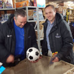 Wildcat baseball coach Chris H. Howard (left) and men's soccer coach Tyler S. Mensch make a predictable choice while toy shopping.