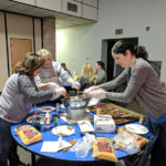Assembling sweet treats for the holiday table are (from left) Phyllis J. Spong, accounts receiving specialist; Susan C. Hartranft, secretary to the School of Transportation & Natural Resources Technologies; and Jennifer A. Cline, writer/magazine editor.