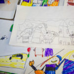 Earlier-in-process images show initial drawings and Stabley’s first sketch.