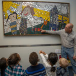 David A. Stabley talks to CLC youngsters about the mosaic.