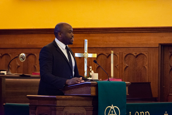 Guest speaker Raphael Mnkandhla, lead pastor of City Church, compares the U.S. civil rights movement with the more recent activity in his native Zimbabwe.