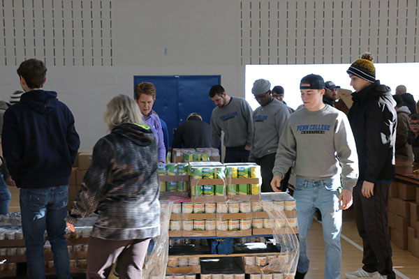 College attire is prevalent among volunteers ...