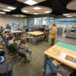 Conversing with students and faculty in the Makerspace