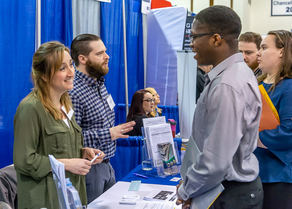 PennDOT's Wendy Manning and engineering design technology student Jahmel Blunt, of Scranton, embody a Career Fair hallmark: face-to-face communication in an informal, stress-free network.