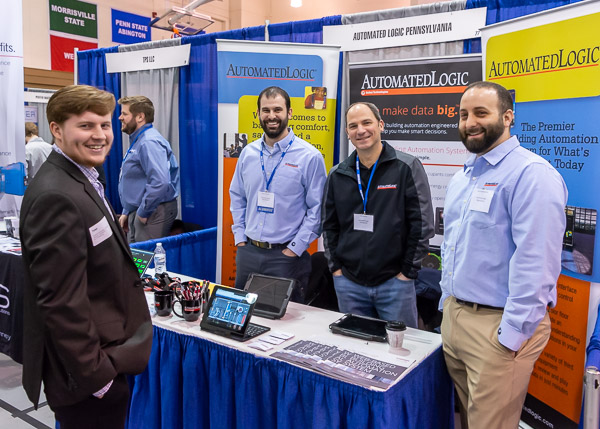 Tyler T. Leonard (left), of Vandergrift, gets a firsthand look at where his degree can lead, thanks to a crew from Automated Logic PA. Leonard, a building automation technology: HVAC concentration student, is joined by Penn College grad Ross M. Hoffman, John Caputo and Derek Manderick.