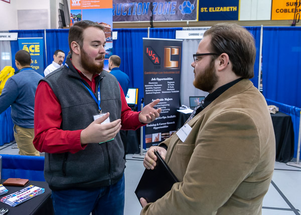 Construction management alum Lane S. Gross, on behalf of corporate donor Kinsley Construction Inc., meets one-on-one with Montoursville's Hunter D. Cero, set to graduate in May in civil engineering technology. 