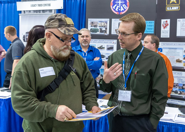 Tony J. Mucciolo (left), of Williamsport, enrolled in manufacturing engineering technology, discusses options with Todd Willhide, from the Letterkenny Army Depot in Franklin County.