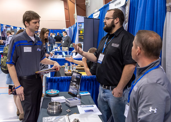 Automated manufacturing technology major David C. McGinniss, of Gettysburg, finds common ground with alumnus Alex M. Ressler, recruiting for The Flinchbaugh Co. Inc.