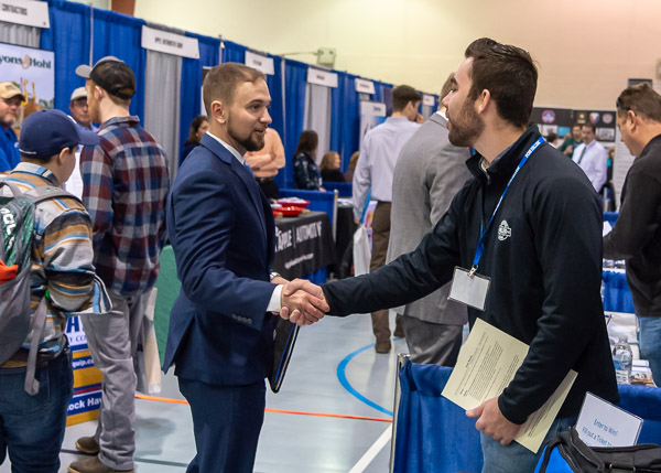 Ryan A. Masden, of Montoursville, pursuing a bachelor's degree in construction management, makes a good impression with Bryan Ralko from CJ Miller LLC. Ralko graduated last May with a bachelor's in construction management.