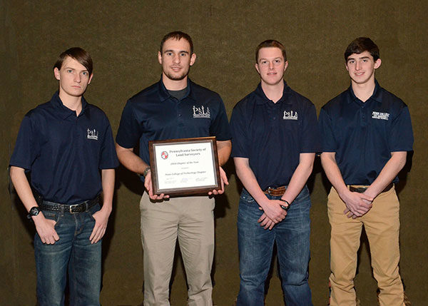 Among the Penn College students on hand to receive “Chapter of the Year” honors from the Pennsylvania Society of Land Surveyors are (from left) Glenn C. Johnson, of Sweet Valley, club president and a scholarship recipient; Jason K. Broadt, of Bloomsburg; secretary; member Jacob G. Stoner, of Scottdale; and Michael A. Mikitish, of Pittston, vice president. Mikitish is a civil engineering technology major; the others are enrolled in surveying technology.