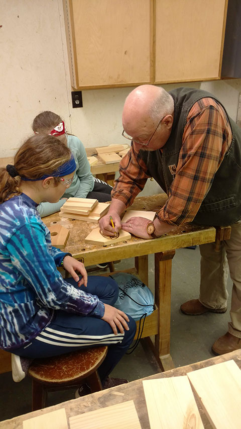 Richard M. Sarginger, a longtime faculty member in building construction technology, guides Catie Lugg (the dean's niece) ...