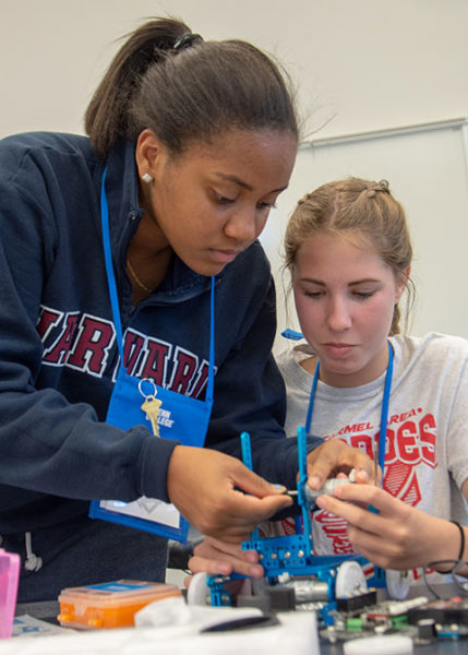 Young women enrolled in SMART Girls, among the wide-ranging roster of pre-college programs at Pennsylvania College of Technology, assemble a robot during last summer’s camp.