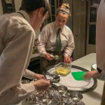 Shannon and Gray plate an intermezzo of tropical citrus sorbet.