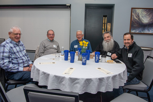 A different type of drafting table! From left: Everett Brandt, ’65, industrial drafting; Ronald Good, ’67, draftsman mechanical; Chalmer Van Horn, ’58, mechanical drafting; Robert Kotarsky, ’66, mechanical drafting, and son Robert Jr. (Van Horn also instructed Brandt, Good and Kotarsky.)