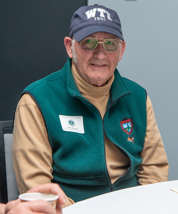 James Harmon, who studied carpentry and building construction, sports a WTI hat.