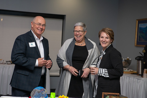President Gilmour (center) shares a laugh with husband Fred, '66, technical illustration, and '72, individual studies, and Loni N. Kline, vice president for institutional advancement.