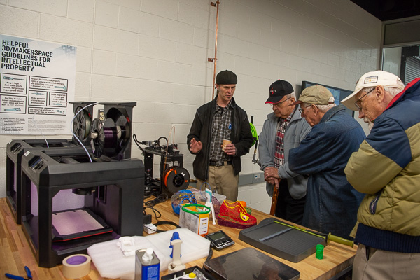 O’Koren discusses 3D technologies in The Gilmour Tinkertorium section of the makerspace during the alumni’s optional tour. 