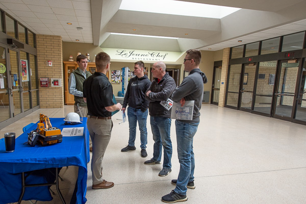 The construction management major took up real estate in the lobby outside the Keystone Dining Room, as well as in labs on the second floor of the Hager Lifelong Education Center. Students Brendan B. Thompson (far left) and Jacob R. Stouffer (back to the camera) discuss inspiring opportunities. 