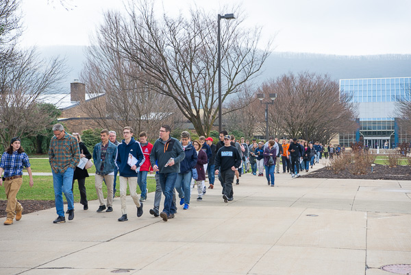Spring Open House unfolds with sizable traffic on the campus mall. 