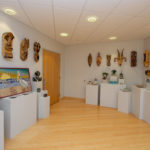 A corner of the gallery lobby beckons art explorers.