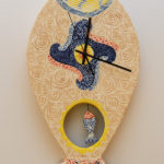 A working clock complete with a pendulum tracks time on a wall. The creation is by Lauren S. Herr, a construction management major from Lititz.