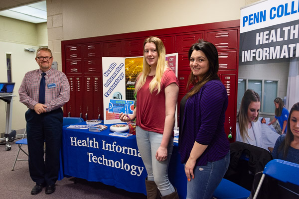 Ready to discuss career options in health information technology are (from left) Dan K. Christopher, assistant professor of business administration/health information technology, and students MacKenzie M. Doyle and Samantha Beers.