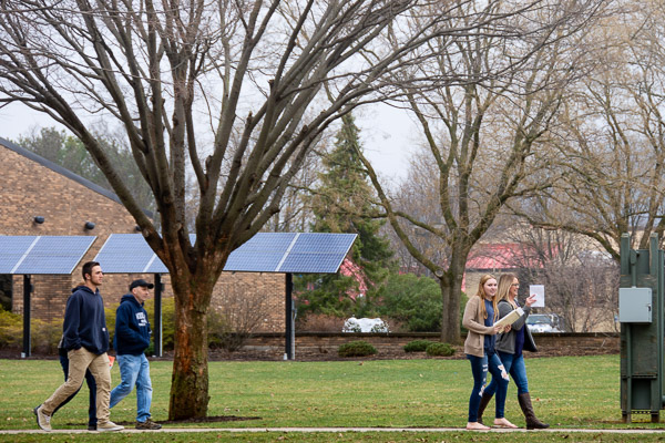 The college's solar panels, as well as passersby, anticipate the arrival of sunshine. (Spoiler alert: It finally – and gloriously – happened.)