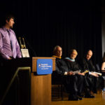 The keynoter addresses his classmates.