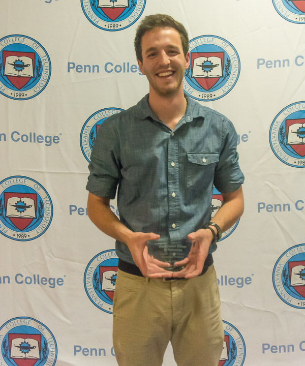 DiBucci accepts one of the banquet's two scholarship awards ... 