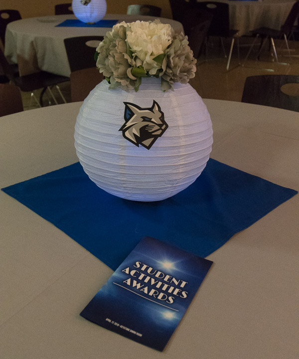 The Wildcat logo attractively adorns the centerpiece at each table.