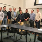 Students gather for a face-to-face meeting with their chosen field.