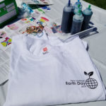 A tie-dyeing station was among the attractions, with commemorative T-shirts ...