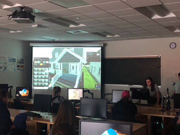 Students give their guests a hands-on look at Lumion, architectural visualization software that renders designs in 3D.