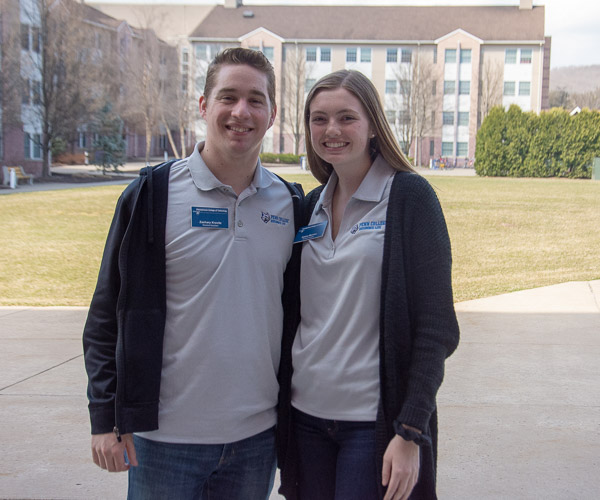 Zachary J. Kravitz, a construction management student from Berwyn, and Alaina M. Murren, a dental hygiene student from Aspers, stand ready to provide information about on-campus housing and student life.