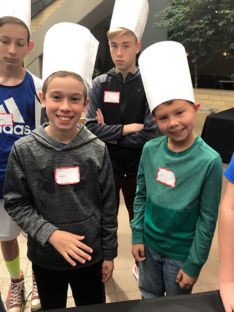 Obviously enjoying their temporary stint as chefs are Ryan Lingg (whose mom provided some of the photos in this gallery) and Cai Cassel, son of Kimberly R. Cassel, director of alumni relations.