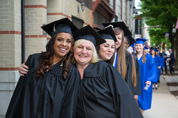 Applied human services graduates show off their warm personalities: Jernae A. Drummond (left) and Lori A. Guthrie, mail services clerk at Penn College. 