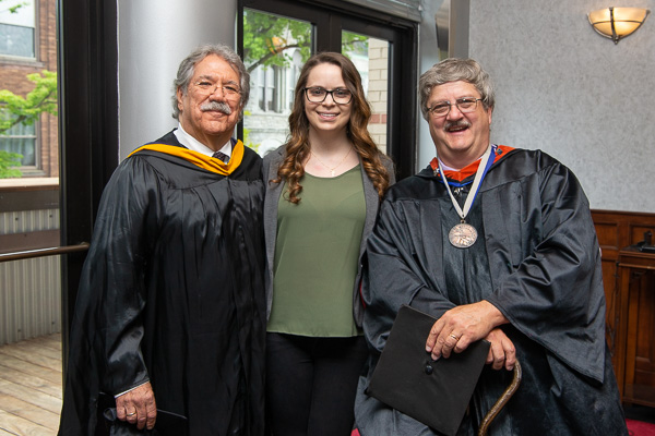 Wisneski reunites with her culinary arts faculty mentors Mike J. Ditchfield (left) and Paul E. Mach.