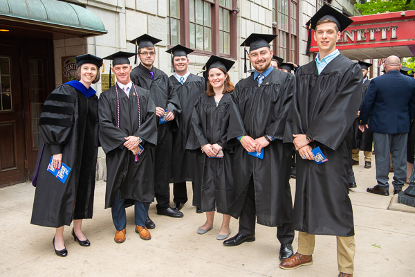 It’s all business – and a dash of fun – for these business graduates and their faculty mentor Tammy M. Rich (far left), assistant professor of business administration/management/event management. 