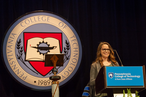 “Chopped Champion” Kristina M. Wisneski accepts her Alumni Achievement Award.