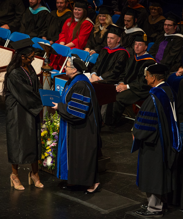 Shanice N. McDowell, business administration: management concentration, is congratulated as she crosses the stage.