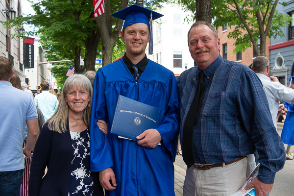 Smiles and pride: Brian S. Mogel, heavy construction equipment technology: technician emphasis, and parents 