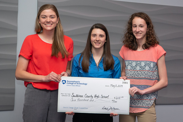 Sullivan County students hold their $600 check for the leadership program's No. 1 project. From left are King, Bednar and Wettlaufer ...