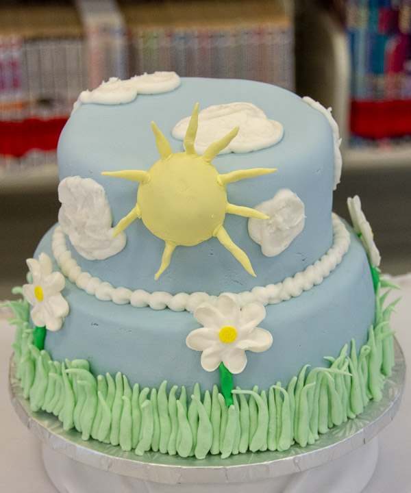 Spring flowers and sunny skies decorate Shannon's cake.