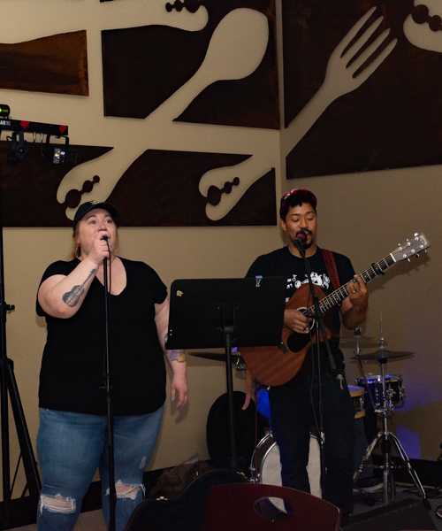 Trésco, a Williamsport-based acoustic band, performs for the breakfast crowd.