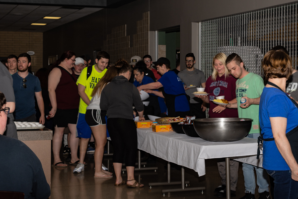 Some of the 600 students served at Midnight Breakfast move through the line.