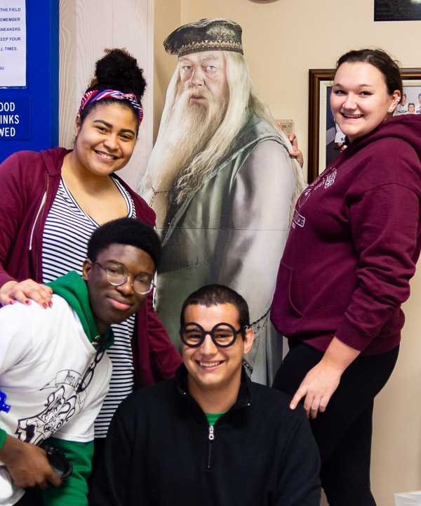 Basking in finals-prep wisdom from Dumbledore are (clockwise from lower left): Matheu A. Davenport, of Lewisburg; Rossell Burgos, of Hazleton; Christine A. Limbert, of Curwensville; and Nathan I. Tabon, of Allison Park.